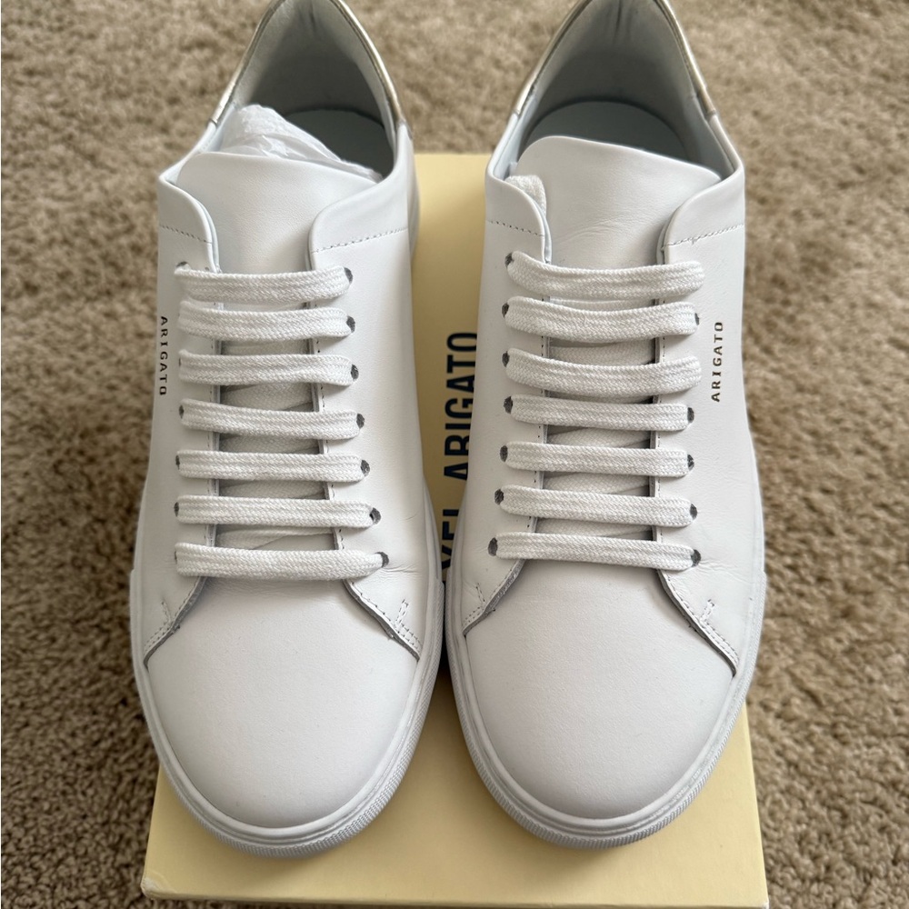 Axel Arigato White/Gold Leather Sneakers